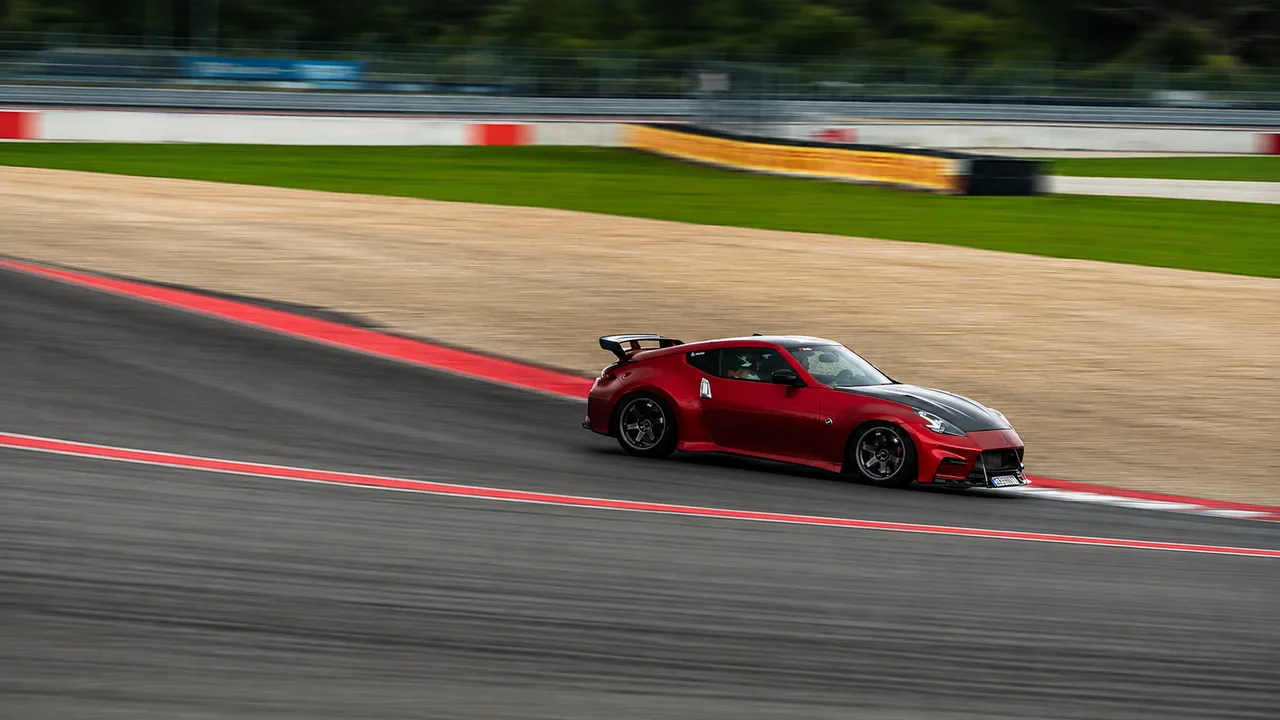 A Zholics 370Z at speed on track at A1 Motor Park