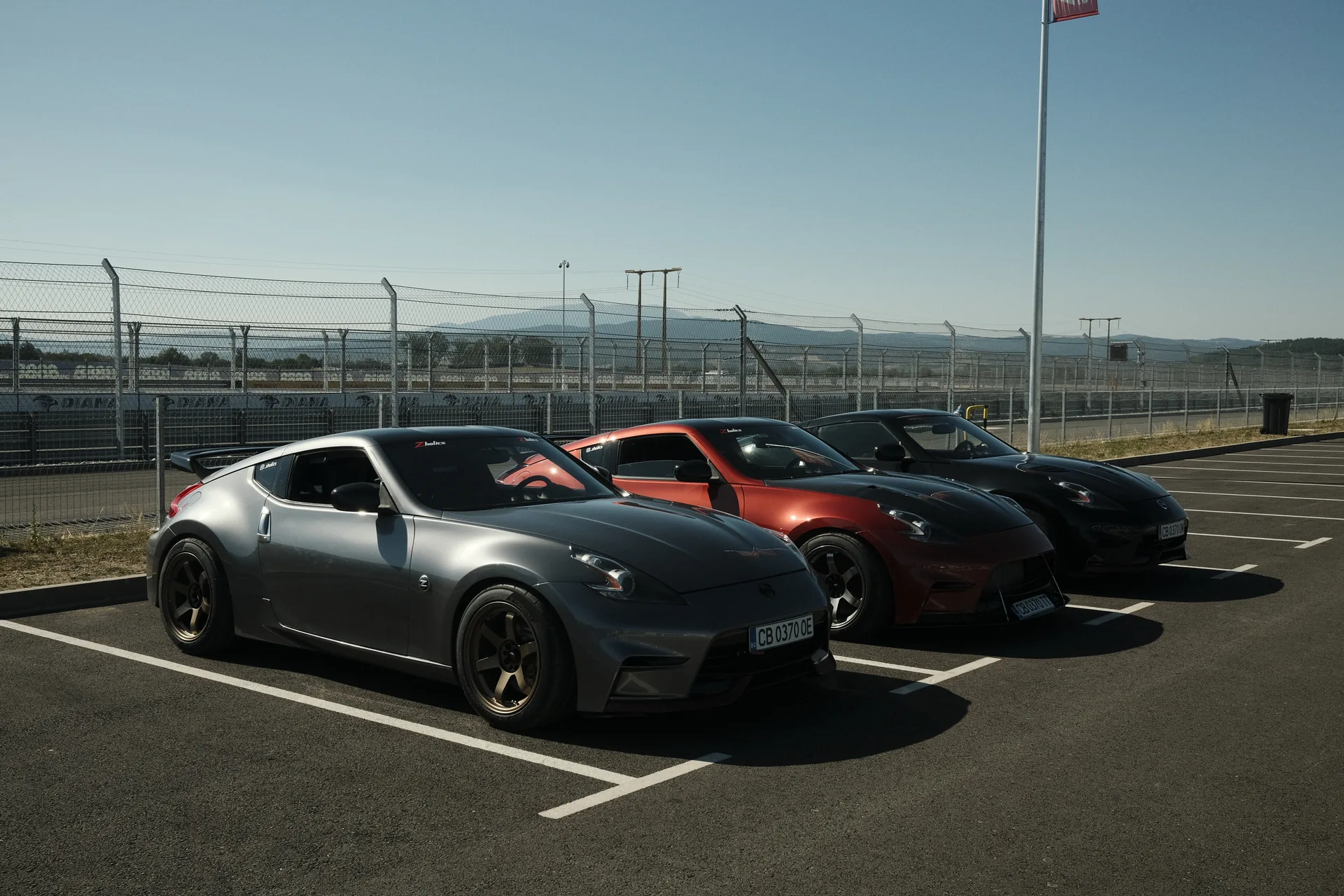 The three Zholics Nissan 370Z track cars lined up at A1 Motor Park