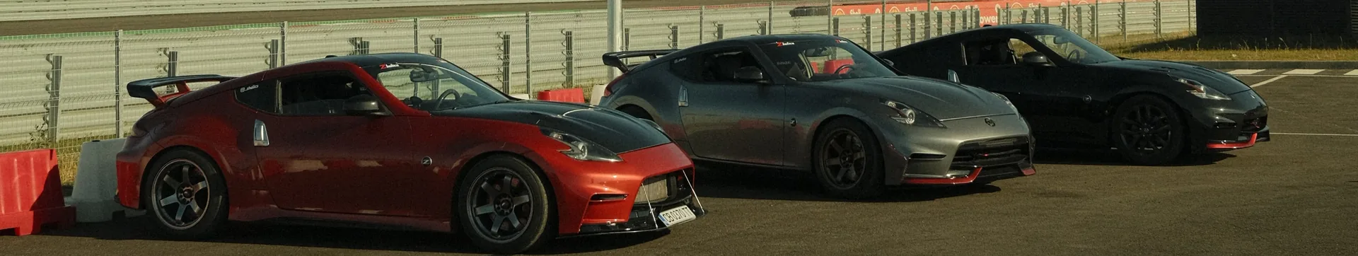 The three Zholics 370Z track cars lined up at A1 Motor Park